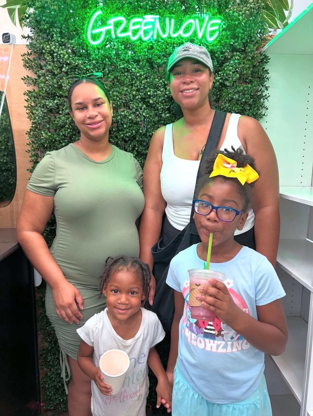 Family enjoying Greenlove drinks